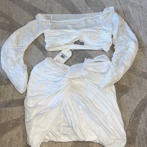 OutCast white skirt set.